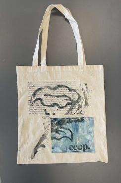Poem printed on the top left hand corner, with a swatch of colour placed in the right. A printed leaf over the top of the bag