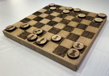 The original board is made entirely from recycled Oak and soft wood laser cut game pieces. 