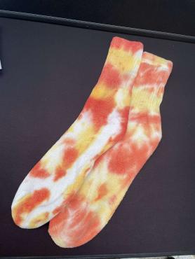 These sunset socks are a combination of yellow, red and orange.