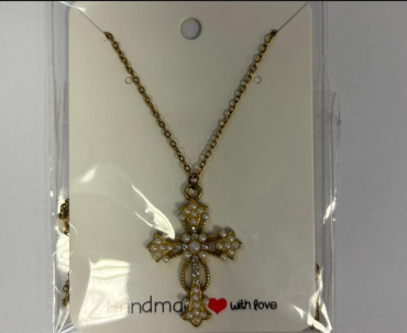 A necklaces with a cross adorned with pearls and diamond.