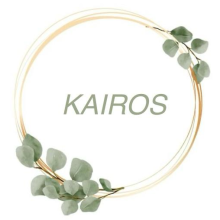Gold ring with greek olive leaves with the word KAIROS written in the middle.