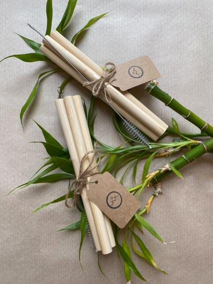 Large bamboo straws with plant background