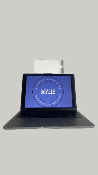 the mylie on top of the laptop