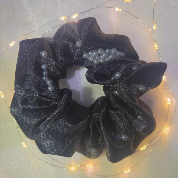 Black satin scrunchie with a layer of black organza on top and filled with pearls
