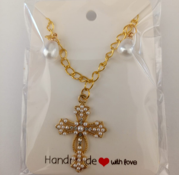 A necklace with pearls and a cross