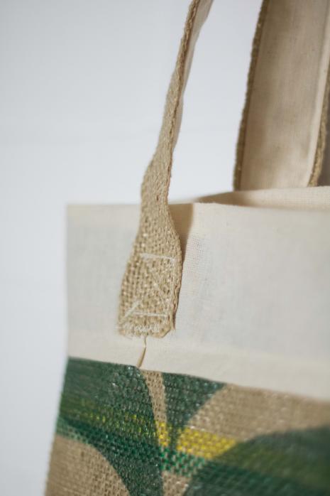 Long handle Sacked Store tote bag handle close-up
