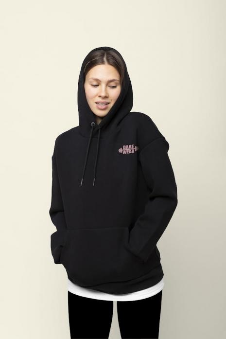 An image of the black hoodie on a model.