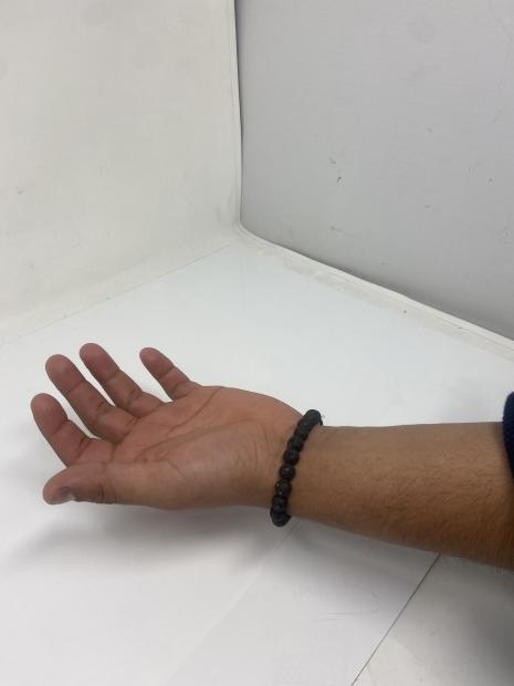 Person wearing our wristband. Shows minimalist unnoticeable look