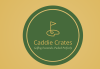 Green circle with a golden ring just inside the circumference, a golden outline of a golf flag hole on the green is in the centre. In gold letters beneath the company name "Caddie Crates" is below it with the company slogan "Golfing Essentials, Packed Perfectly."